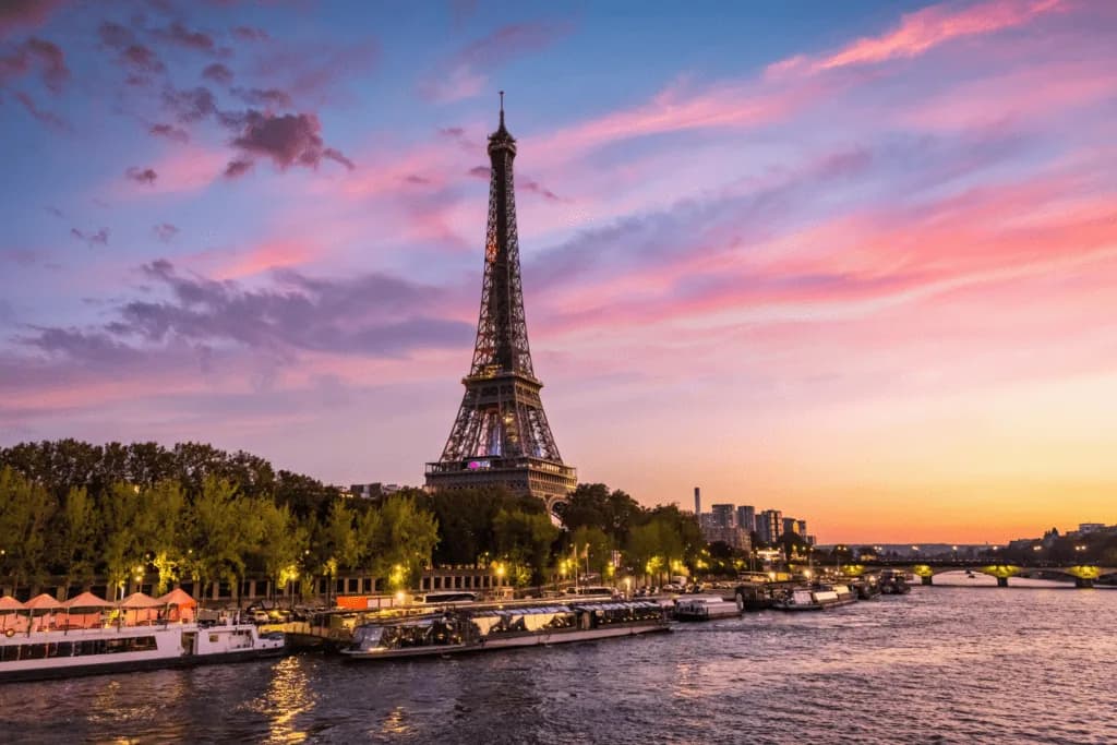 Eiffel Tower and the Seine at sunset in Paris, host city of Parcel+Post Expo 2027