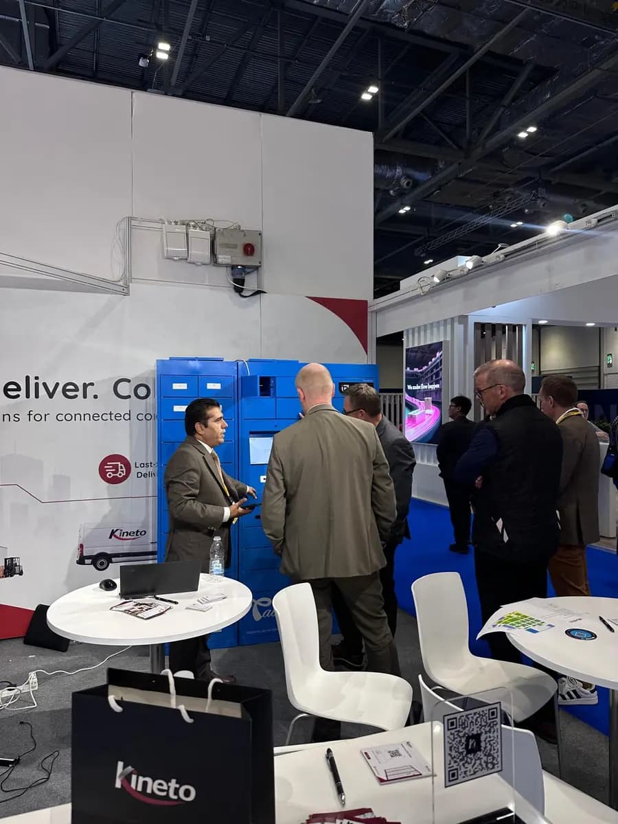Kineto team member presenting smart parcel lockers to visitors at Parcel+Post Expo London 2026