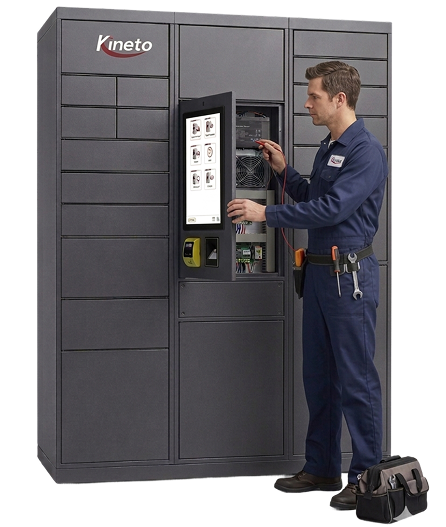 kineto A technician in a blue uniform stands next to an open Kineto locker system, using a touchscreen and tools to access electronic components inside; a tool bag sits on the floor nearby.
